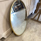Miroir forme ovale contour métal doré années 1960/1970