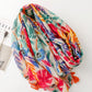 Grand foulard imprimé feuilles multicolore avec pompons