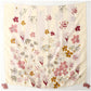 Grand foulard imprimé fleurs avec pompons