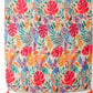 Grand foulard imprimé feuilles multicolore avec pompons