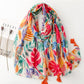 Grand foulard imprimé feuilles multicolore avec pompons