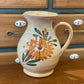 Pichet carafe en terre cuite décor fleurs
