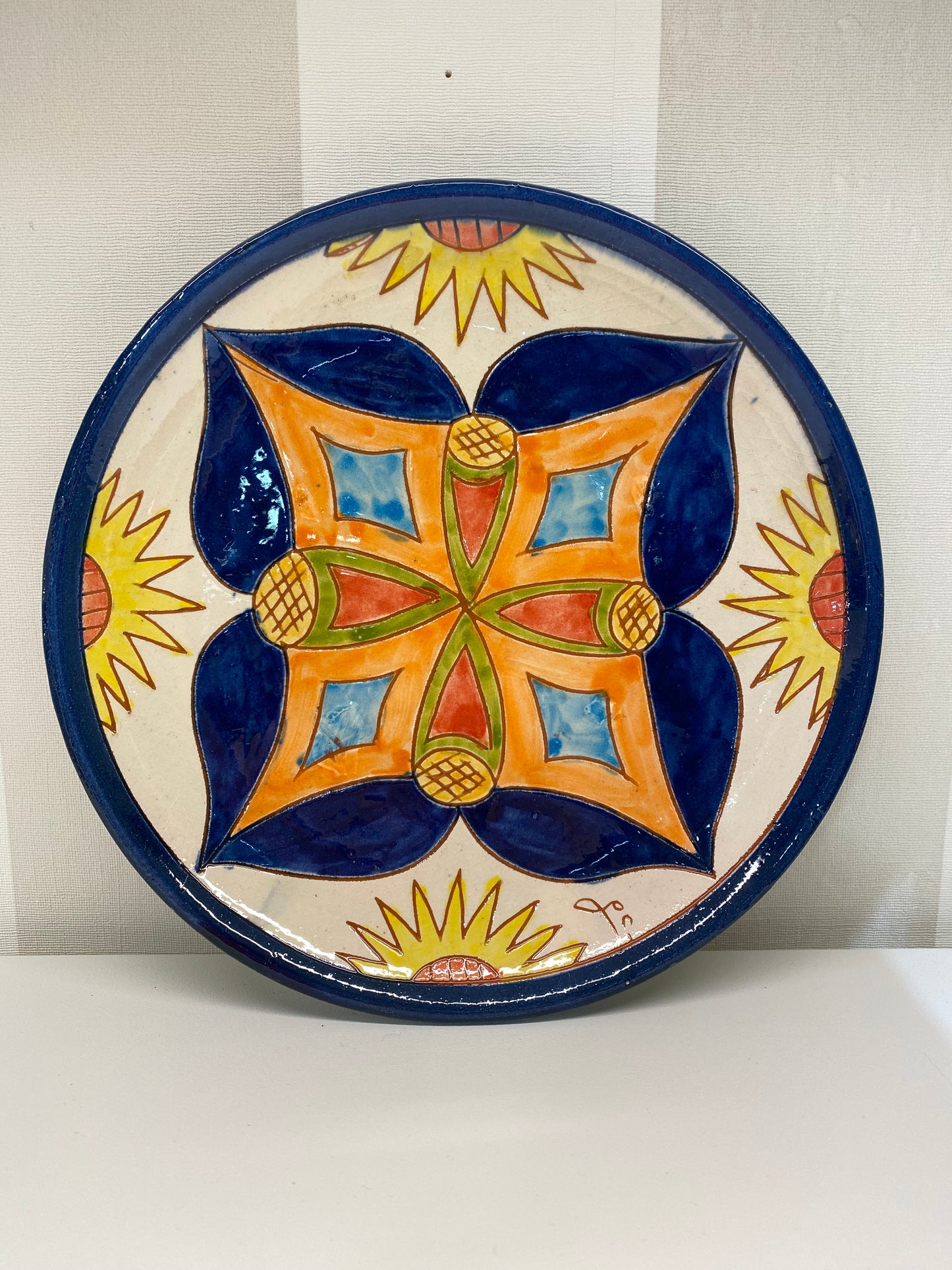 Assiette décorative artisanale terre cuite