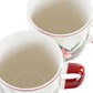 mug en PORCELAINE "poinsettia et rouge gorge"